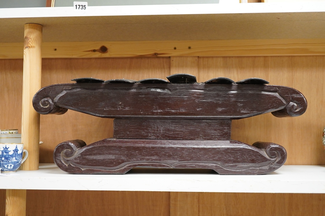A carved and gilt Balinese Gamelan, 60cm